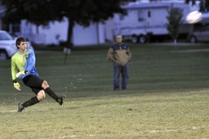 Layne Frank kicks the ball away