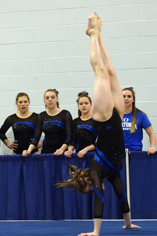 Becca Olson performs her floor routine.