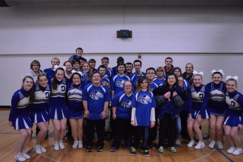 The Adaptive Floor Hockey team and the OHS student section and cheerleaders