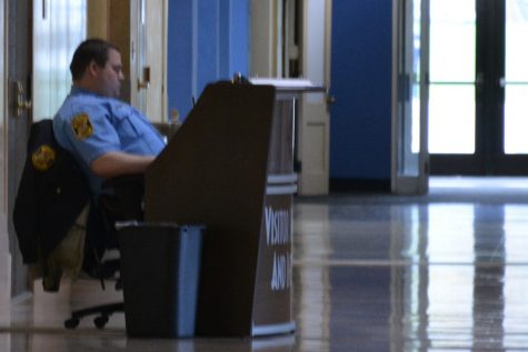 CSO Travis Johnson watching the cameras at the security desk
