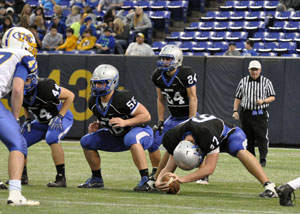 Sam Noeldner, Matt Kern and Nick Rappe get ready for a play.