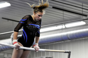 Sophomore Stephanie Kretlow on bars.