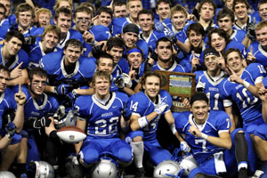 The OHS football team celebrating their victory against Brainerd in the finals for state. 