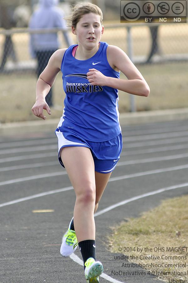 Sophomore runner Kristen Rysavy participates in a race