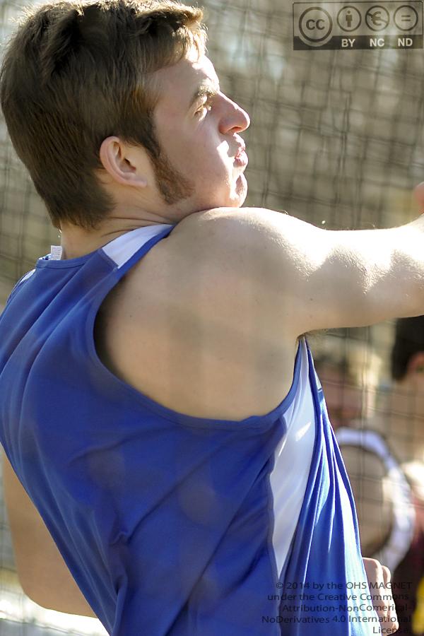 Jesse Starks throws Discus at the track meet, winning 6th place