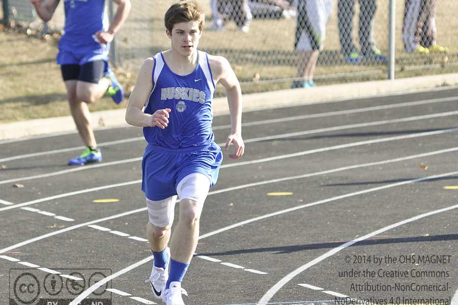 Vince Spurgeon paces himself during the 400 meter dash
