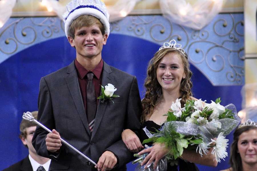 Homecoming King Dexter Leer and Queen Abby Bendorf smile for their friends and family