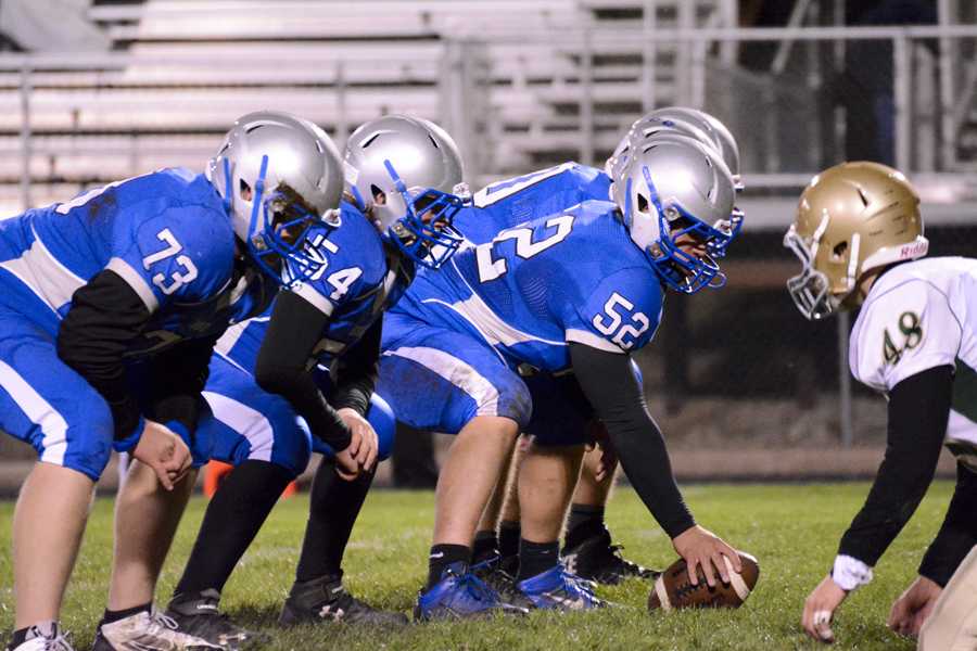 Owatonna footballs offensive line mans up to make a play