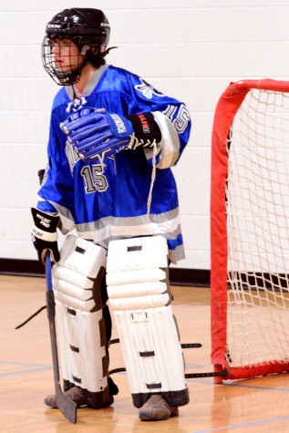 Number 15, Nick Abernathey prepares to block the goal. 