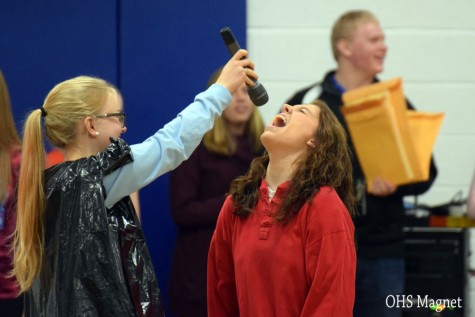Senior Maria Golberg singing during a skit during the pepfest