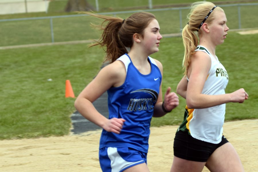 Freshman Mary Sager running in the meet