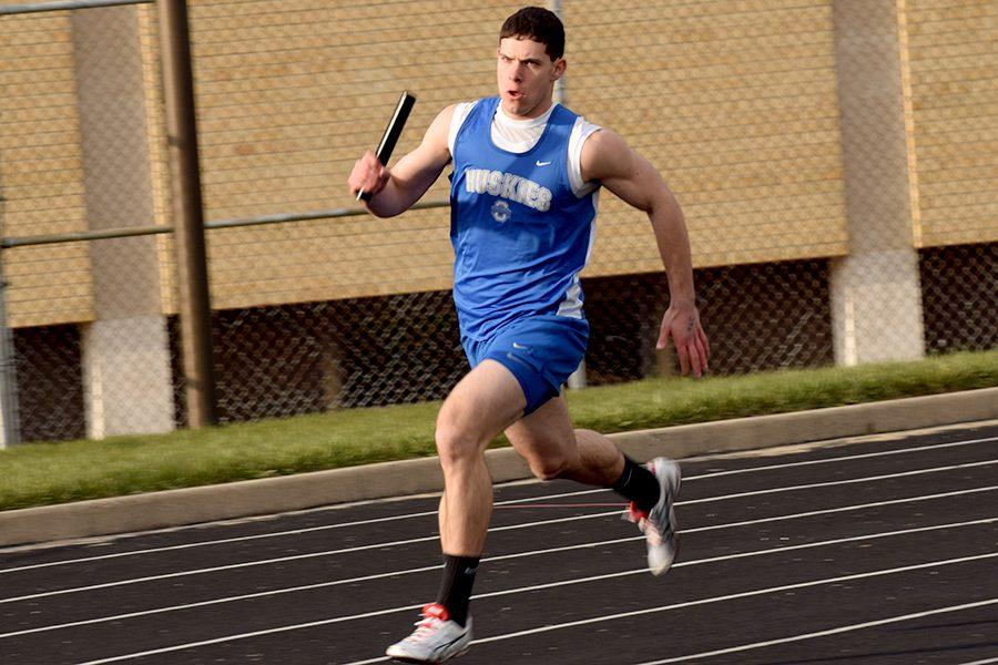 Senior Ryan Guenther running in the relay