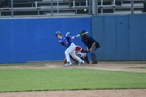 Kodey Kiel hits the ball to left field