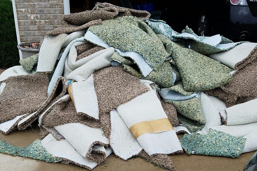 Carpet from the basement of Josh and Emma Burns. This is the third time the family has lost their basement due to flooding