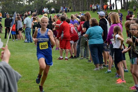 Liv Larson sprinting through the course