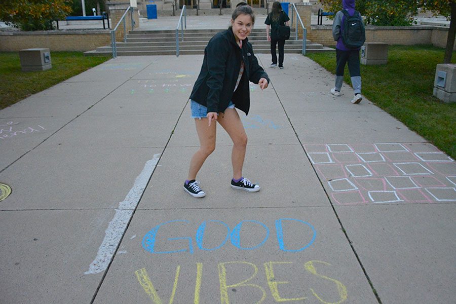 Freshman Izzy Melgaard posing because the good vibes made her smile.