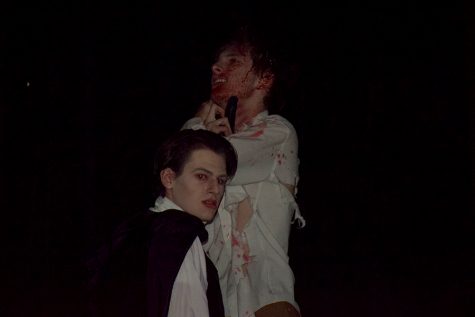 Ian Crum as Dracula choking Robert Renfield