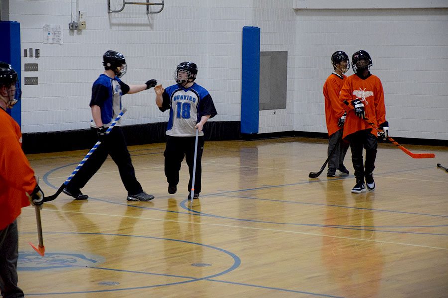 Sam Mullenbach and Zach Sencer talk between plays during the floor hockey game.  