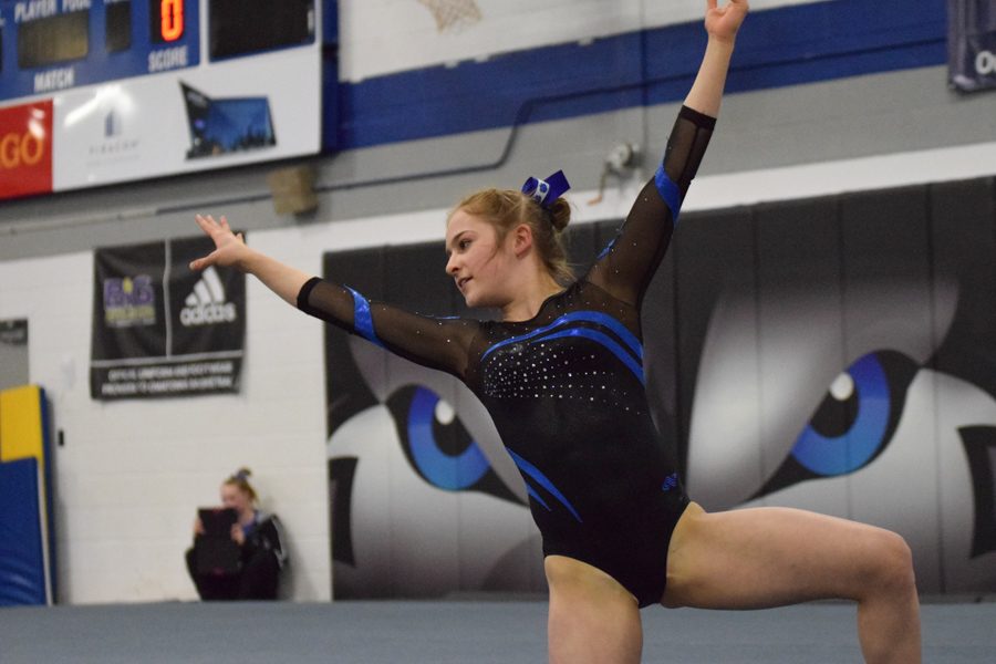 Becca Olson performs her floor routine