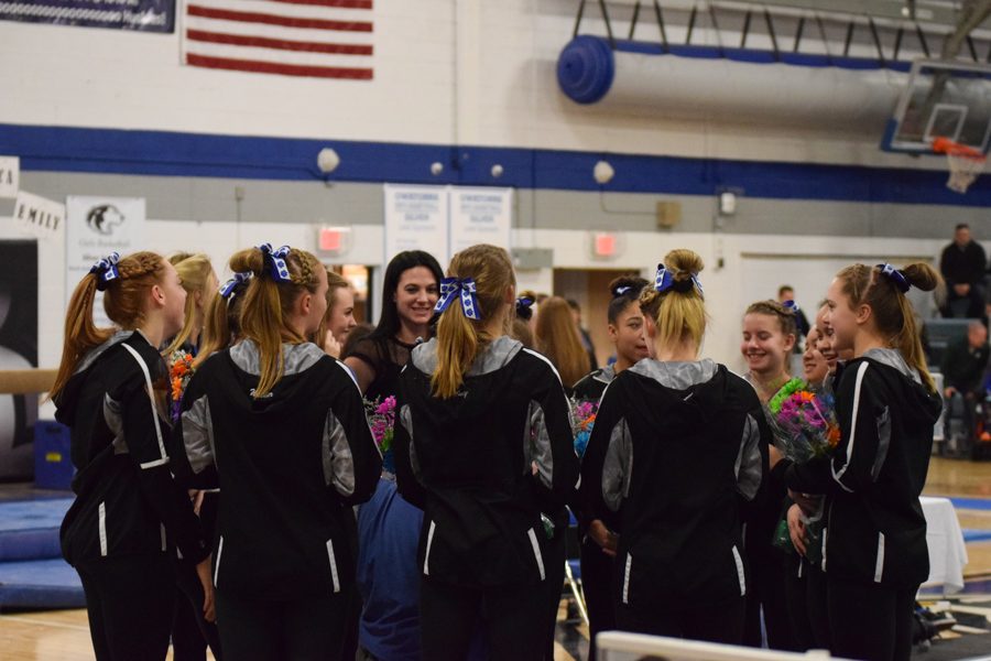 The team has a pre-meet meeting