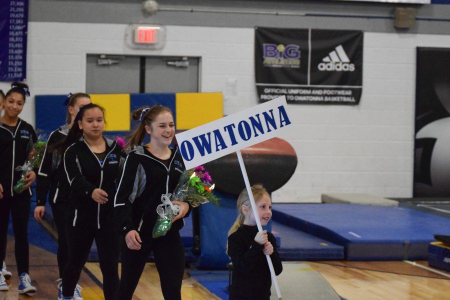 Owatonna is lead in during the parade of champions
