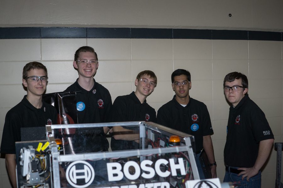 Drive team members Zach Noyce, Mark Kubista, Sam Bendorf, Roshan Poudval and Max Liedtke pose before their next match