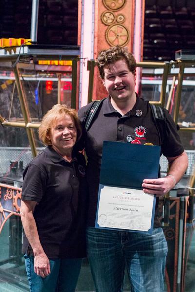 Harrison Kuhn and Mentor Mrs. Rose pose with the Deans List award