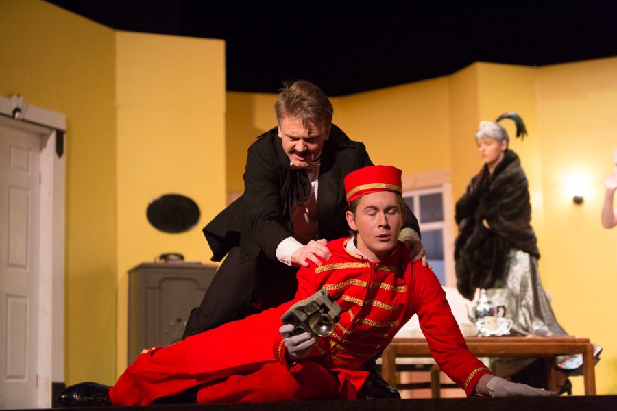 Jeff Booker (Bellhop) gets tackled by Isaiah Damitz (Henry Saunders)