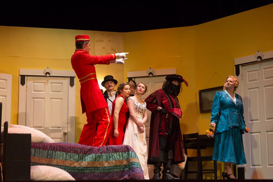 The Bellhop points towards the door where Max is behind.
(Jeff Brooker)