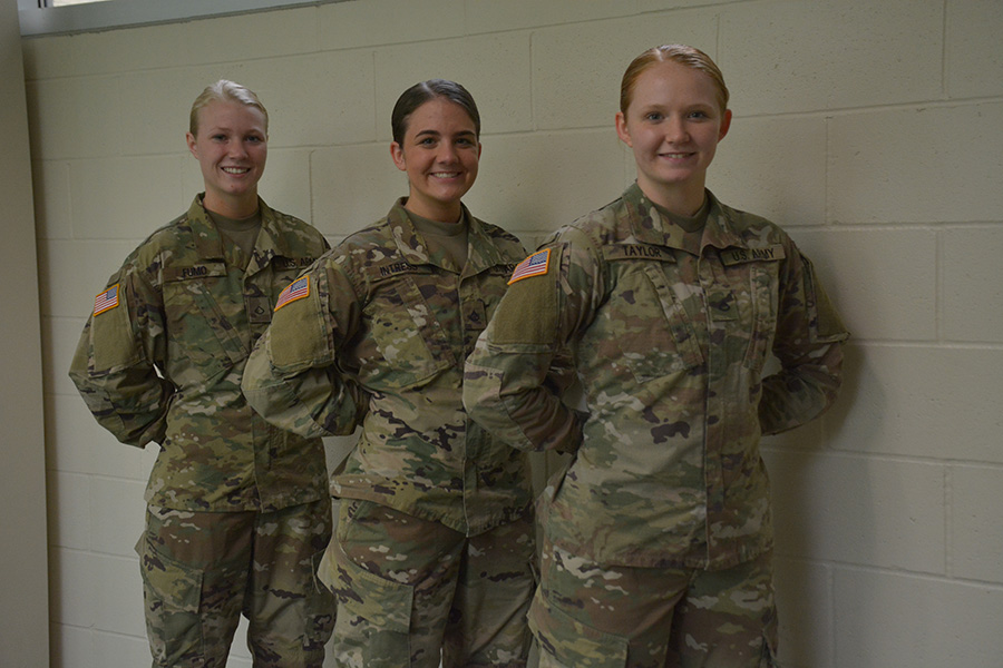 Seniors Jade Fumo, Ashley Intress and Shelby Taylor standing in their Military uniforms