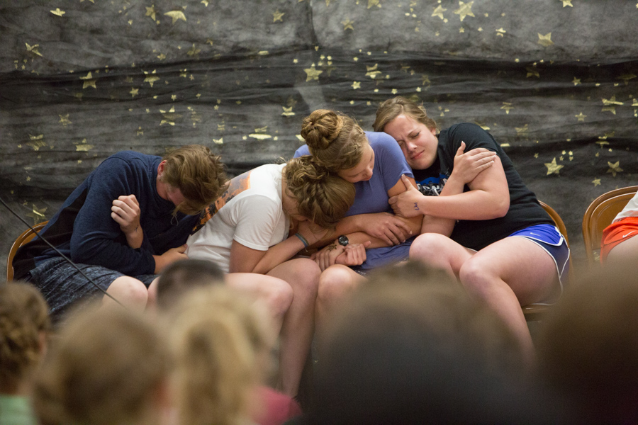 Joey Howell, Erica Svenby, Lydia Weisenburger and Ashley Beckman huddle for warmth