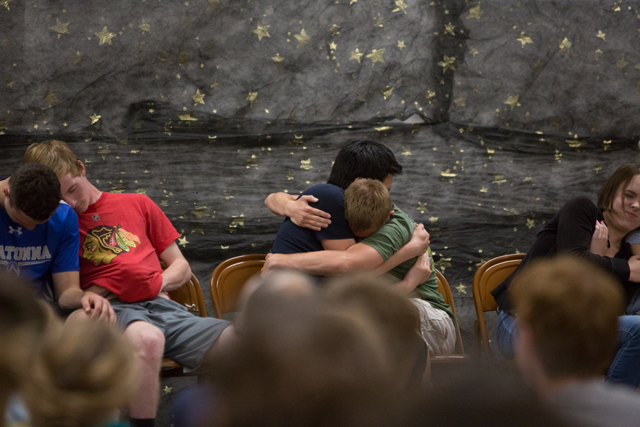 Juniors Luke Johnson And Evan Steiger are hypnotized to hug for warmth