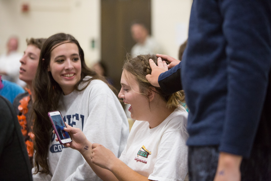  Junior Lydia Weisenburger pets  senior Katie Segler's hair as if it were a Koala 