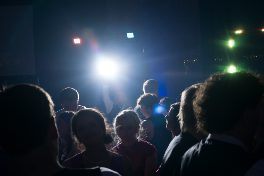 Prom goers dance under the lights
