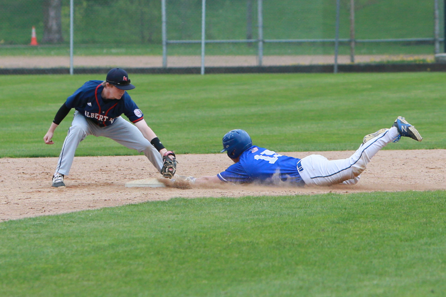 Nathan Deason steals second base against the tigers