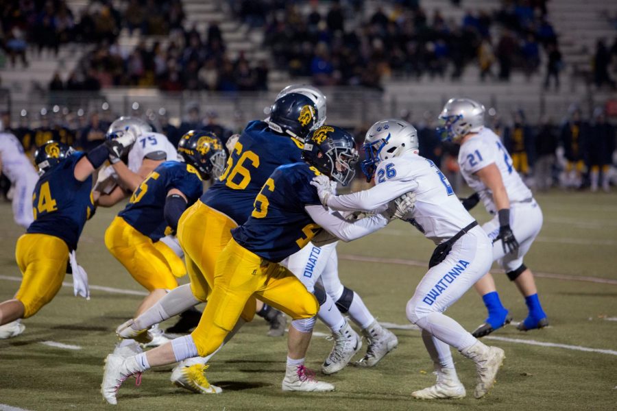 Mitch Wiese battling the Mahtomedi offensive line
