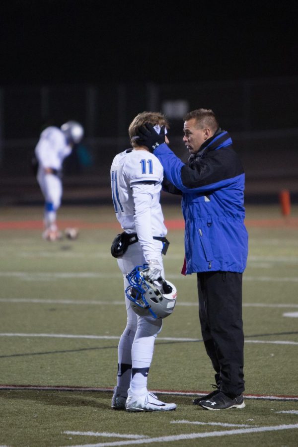 Coach Eggermont talks to junior Ben Zappa