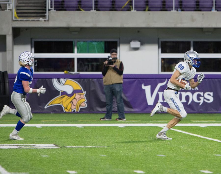 Senior Dalton Kubista runs the ball in for a touchdown