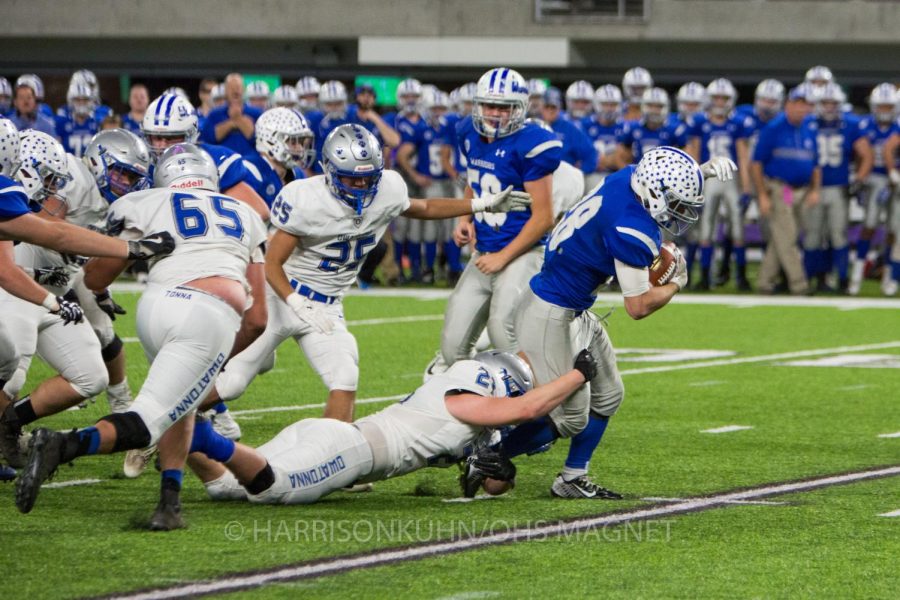 Zach Mensink tackles a Brainerd running back