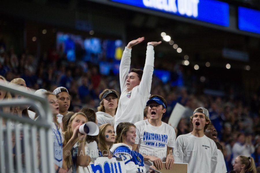 Ian Rubish leads the student section in cheers
