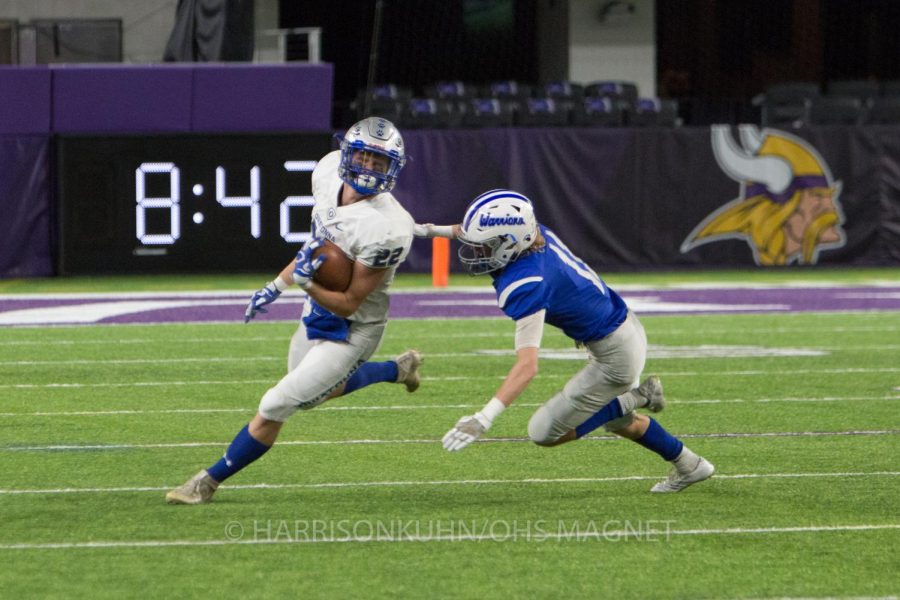 Jason Williamson running past a Brainerd defender