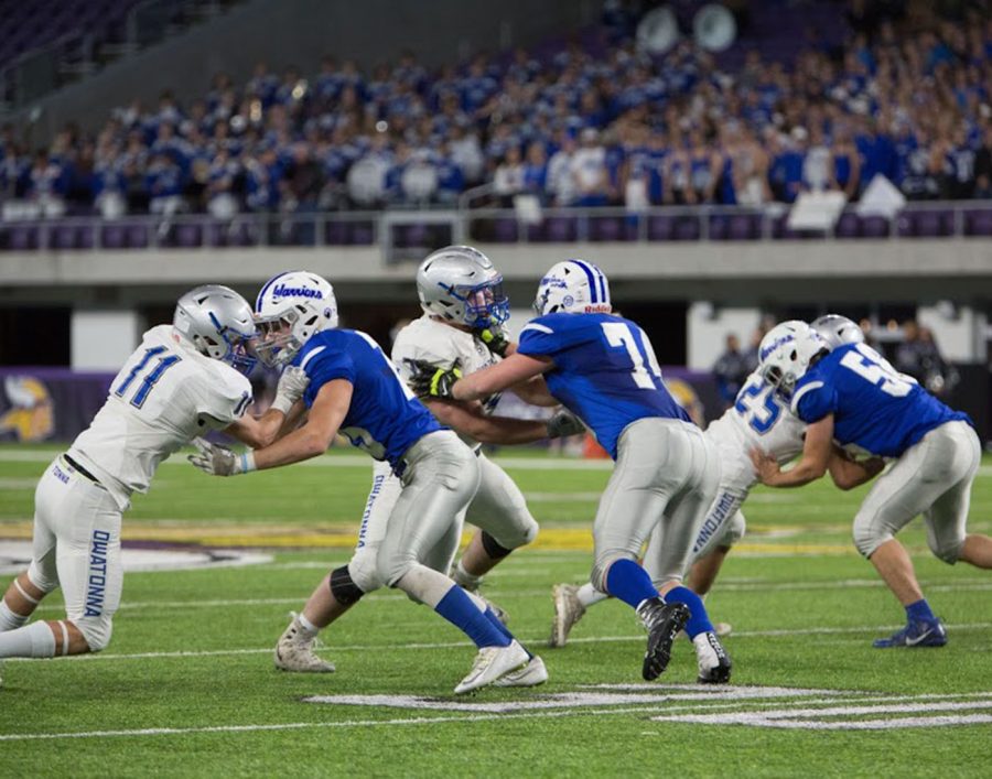 Ben Zappa and Kadyn Mulert work to  past their man on defense
