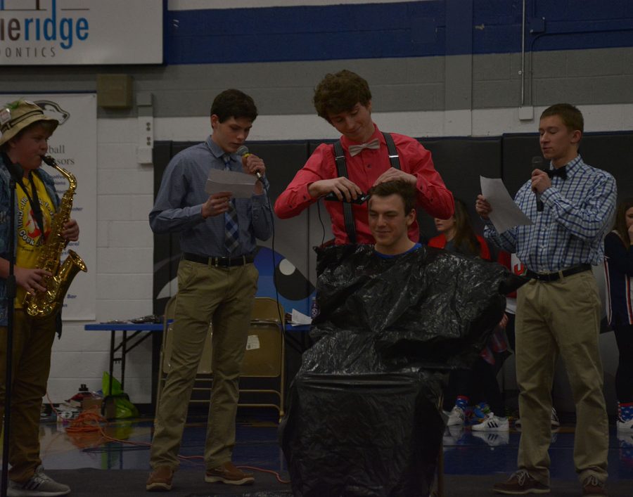 Senior Spencer Steckelberg gets his head shaved for his skit