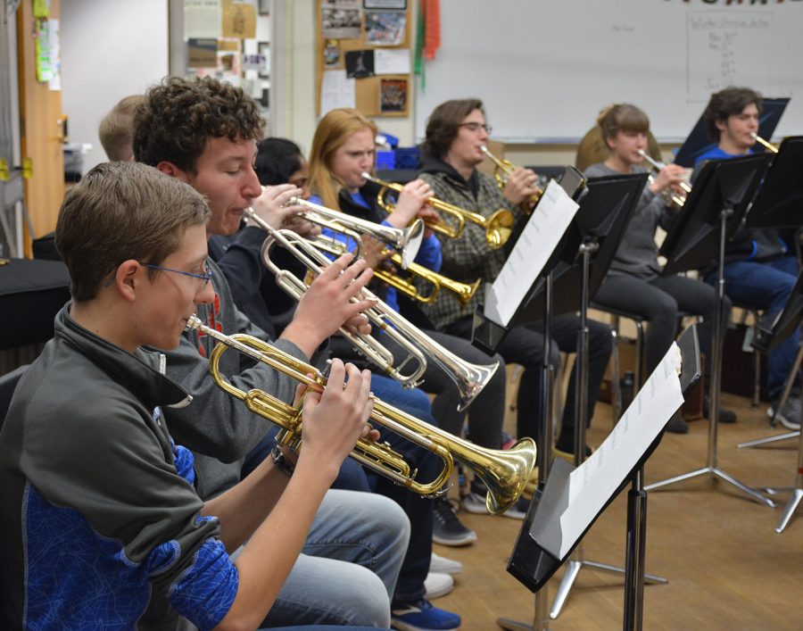 The trumpets practicing during band class