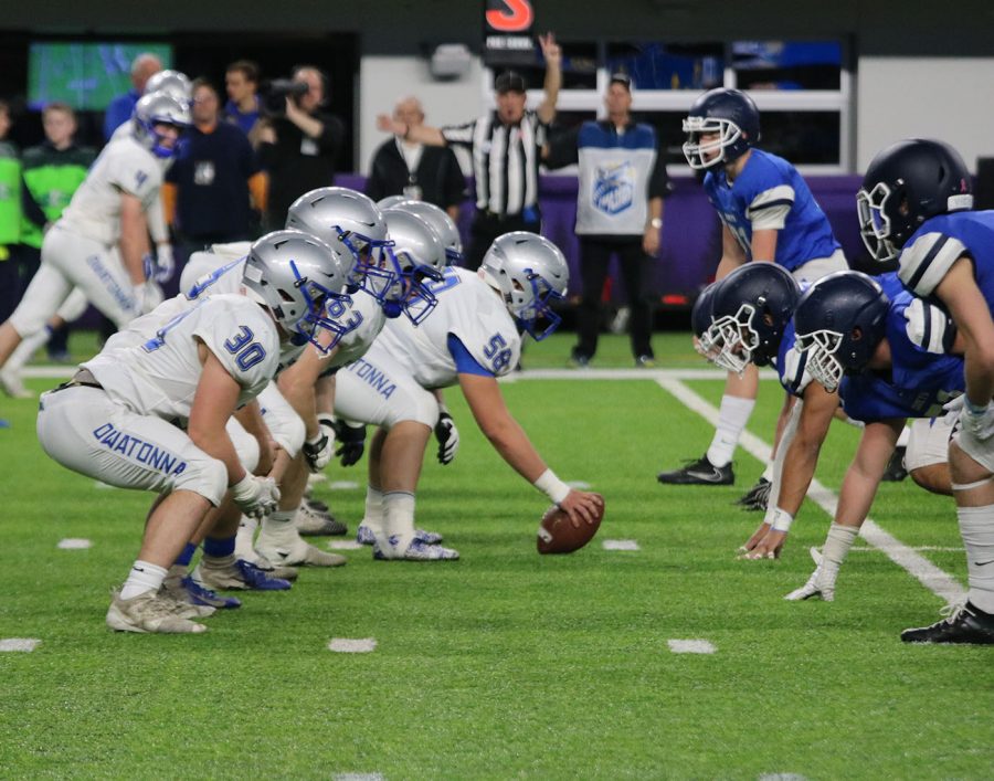 Owatonna blue collar lines up pre-snap