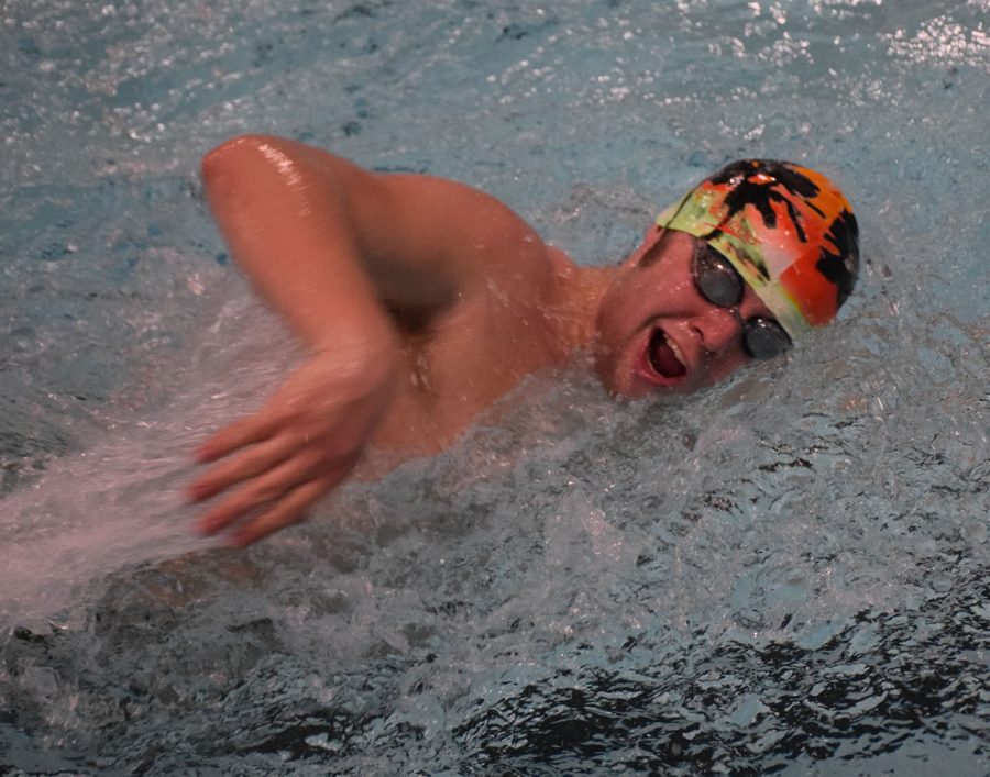Payton Jorgenson swims during his event