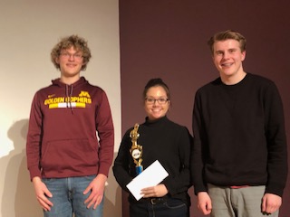 Owatonnas music listening team with thier first place trophy from the regional competition