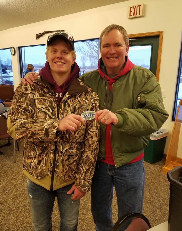 Joe Edel receives his Perfect 25 patch from late head coach Dave Schroeder 