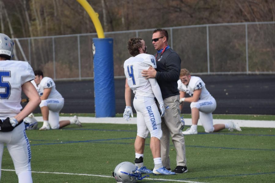 Senior Ethan Walter with coach Jerry Eggermont before the class 5AAAAA state quarterfinal game.