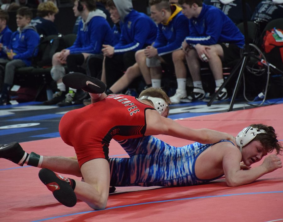Kanin Hable fights against Shakopee wrestler to evade being pinned